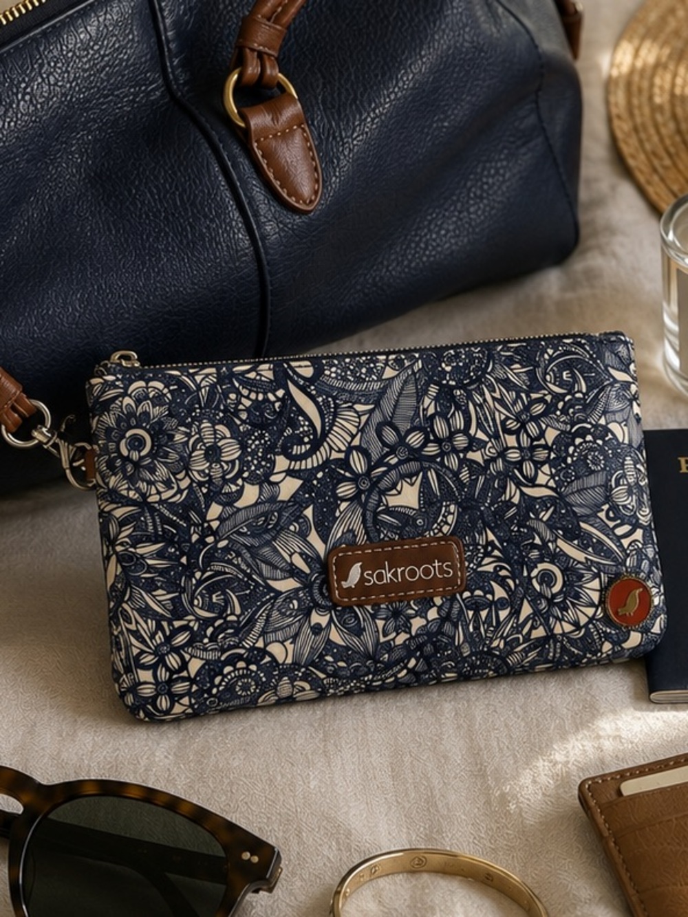 Sakroots Navy Floral Wristlet with Camel Strap